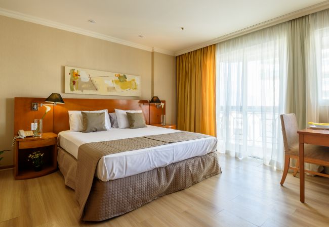 Cama King Quarto aconchegante e bem decorado