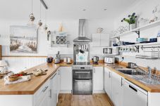 Open kitchen and dining space in Torquay retreat